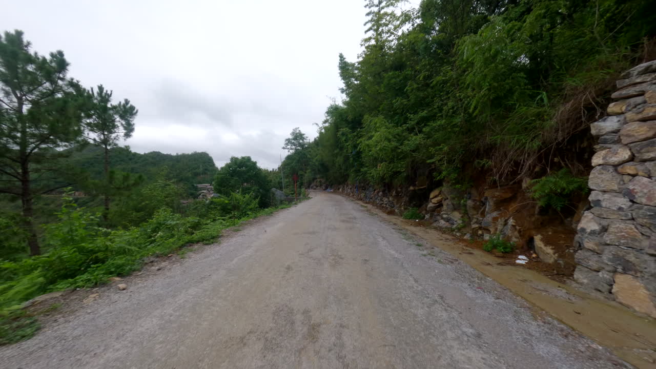 Driving Fast Across The Mountain Road In Ha Giang Loop, Vietnam. POV Shot