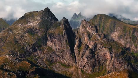 Aerial-view-of-Segla-mountain-above-the-sky,-Norway-during-summer