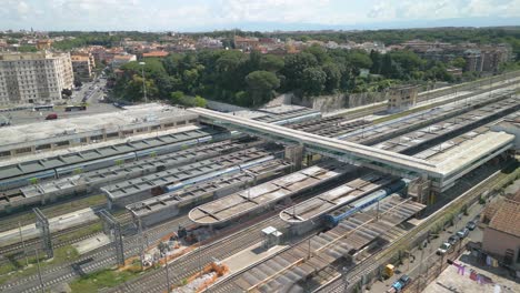 aerial view above roma ostiense train station in rome, italy