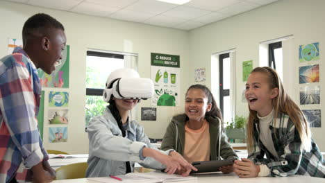 in school, multiracial students collaborating eagerly exploring virtual reality and tablet