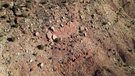 Aerial-reveal-of-some-of-the-majestic-mountains-of-Zion-National-Park,-filmed-from-outside-the-park-over-Springdale,-Utah