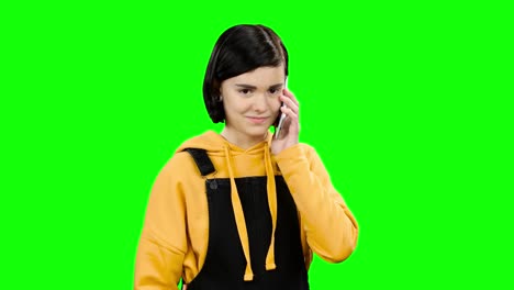teenager on phone, upset expression