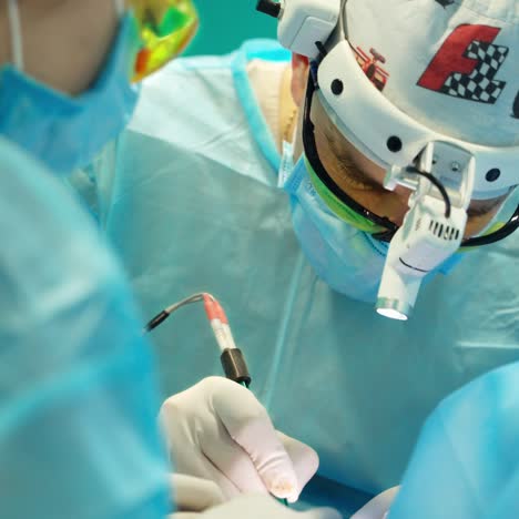 male surgeon in operation room