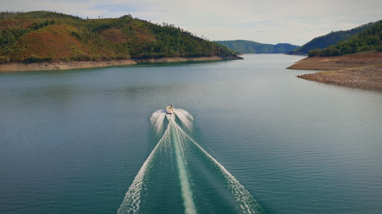 boat ride in river long drone shot