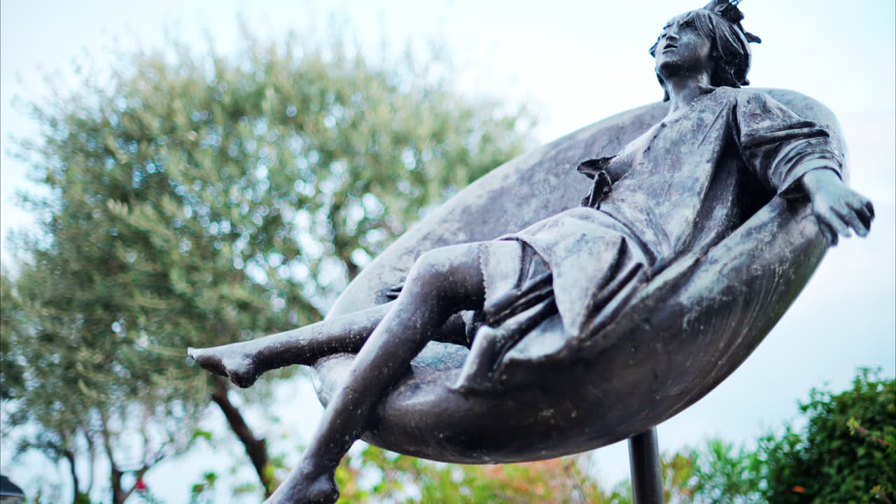 Monte Carlo, Monaco - October 4, 2024: Tebe in costume by Giacomo Manzu bronze sculpture on the street