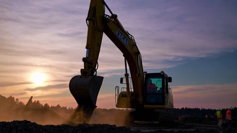 excavator at sunset