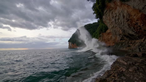 powerful waves crashing against coastal cliffs