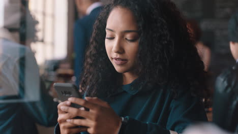 beautiful teenage girl using smartphone in cafe texting sharing messages on social media enjoying mobile technology relaxing in coffee shop