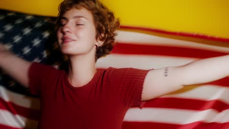 woman holding american flag