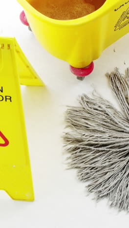 cleaning floor using a mop