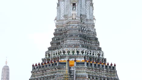 wat arun temple with intricate architectural details