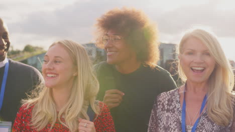 Group-Of-University-Or-College-Students-With-Tutors-Outdoors-On-Campus-Smiling-And-Looking-At-Camera