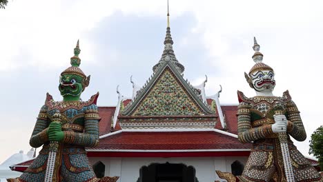 visitors explore wat arun's iconic entrance