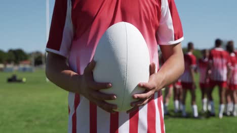 rugby player playing with rugby ball