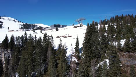 panoramic view of a snowy mountain ski resort with a ski lift