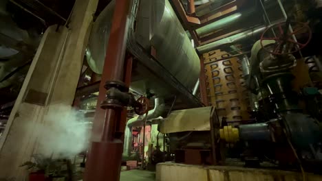 smoke is being released from boiler in a sugar mill factory during sugar production