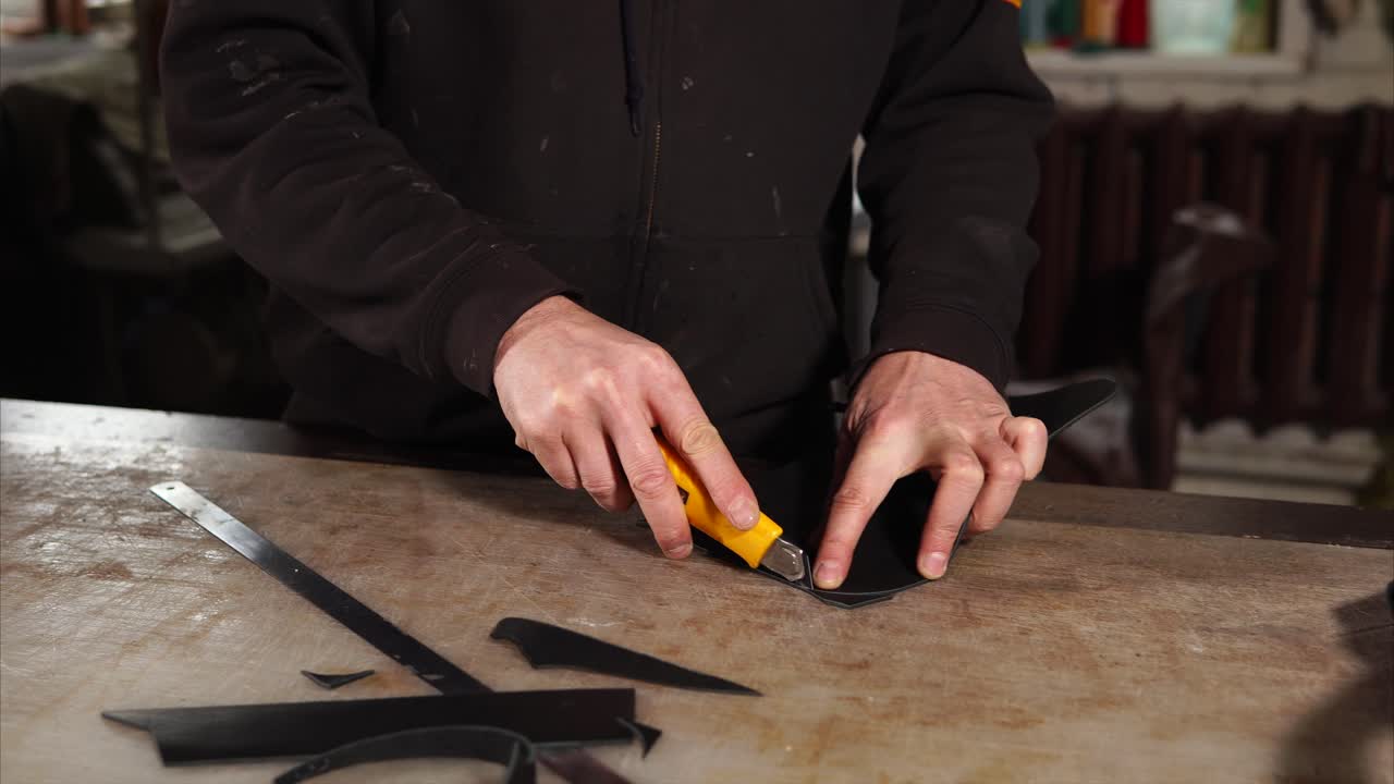 Leather Craftsman Cutting Leather