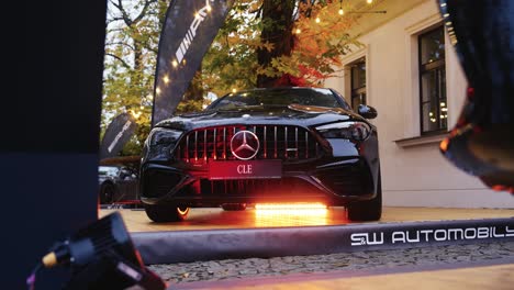 black car with large logo on radiator grill parked near building, czechia