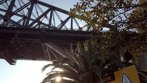 Beautiful-panning-close-up-shot-of-the-Sydney-Harbour-Bridge-below-the-bridge