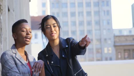 businesswomen interacting with each other in balcony 4k