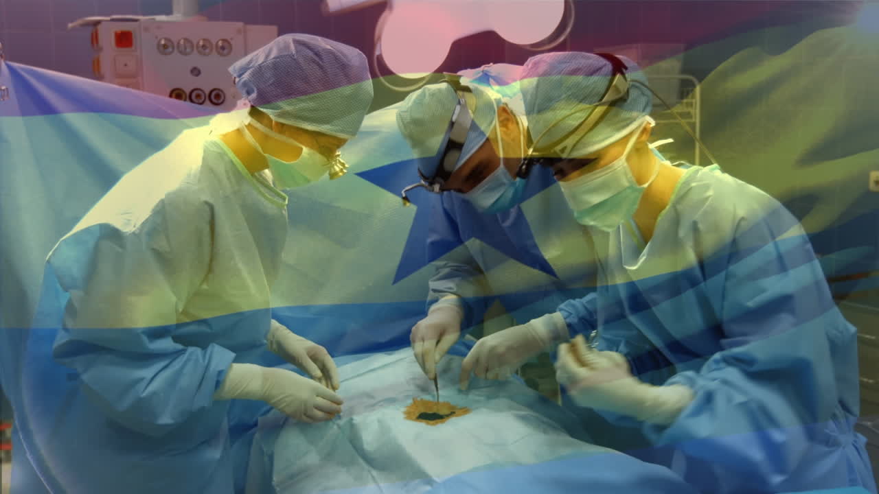 Animation of flag of ghana waving over surgeons in operating theatre