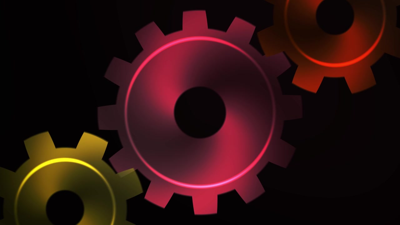 Three Colorful Gears Rotating on a Black Background
