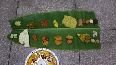 indian-traditional-mithila-region-food-served-at-banana-leaf-at-festival-from-different-angle