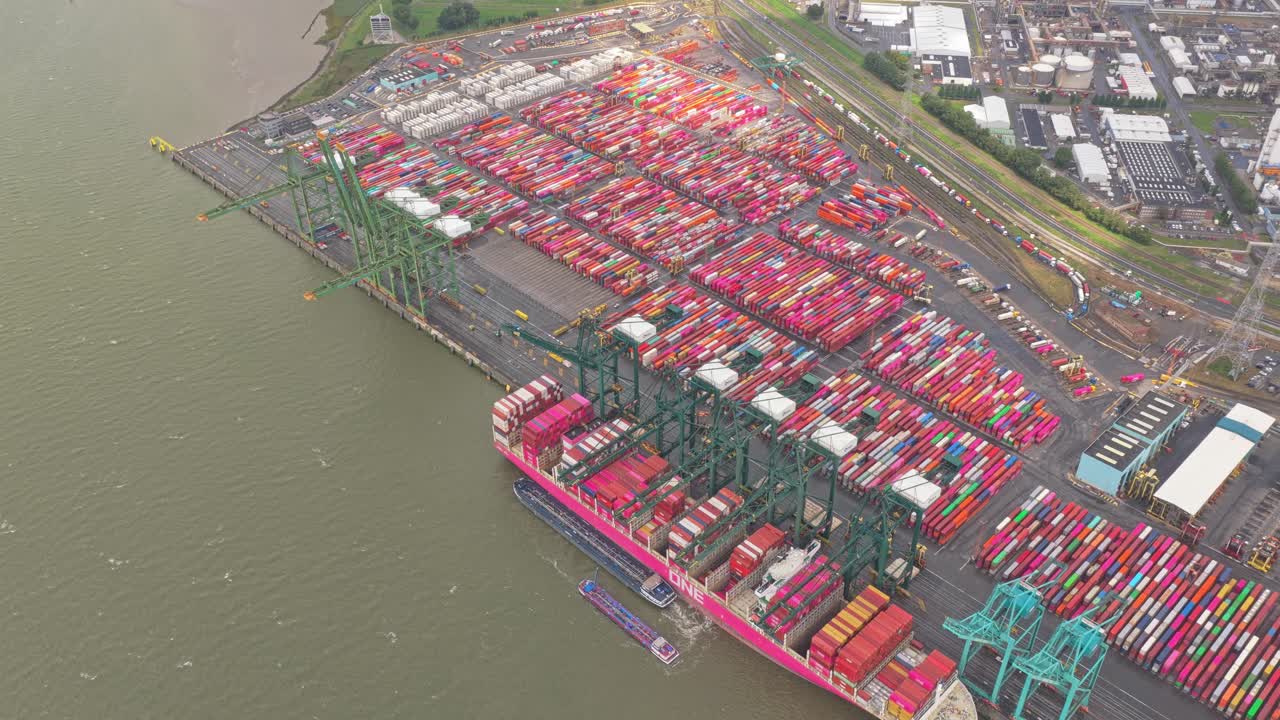 Industrial Antwerp harbor with container stacks and shipping terminal, Belgium