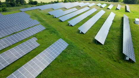 Power-Plant-Using-Renewable-Solar-Energy-With-Sun---Solar-Panels-Near-Gdansk,-Pomerania,-Poland---drone-shot