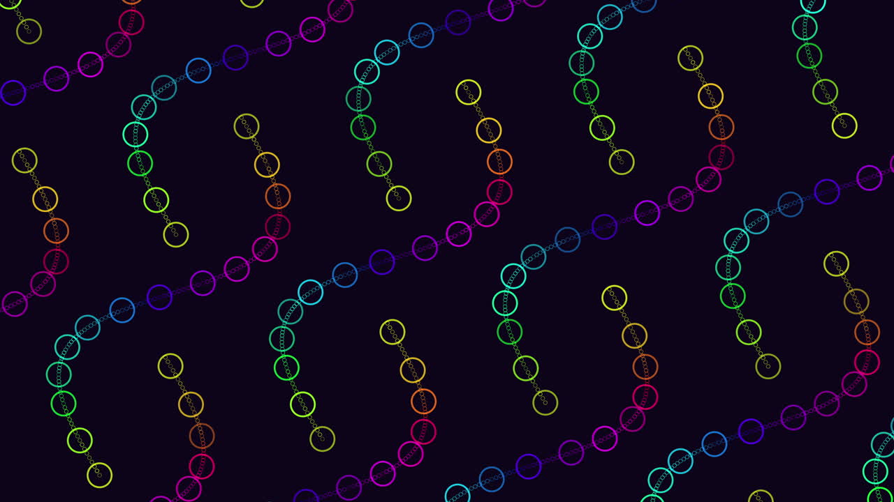 A vibrant arrangement of circular colored patterns on a black backdrop creates an intriguing and dynamic visual display