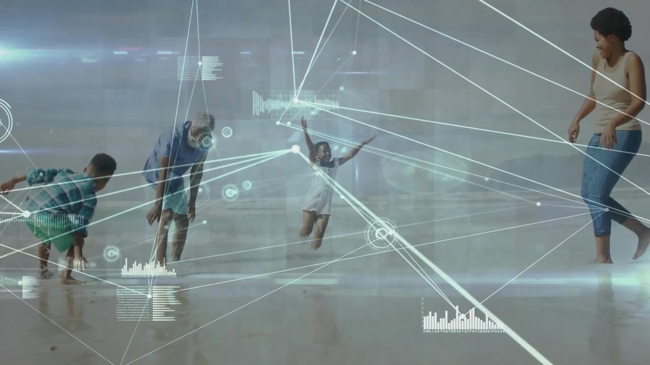 Family playing on wet sand, boy running inward joining, adults bending, reaching, tech HUD crossing