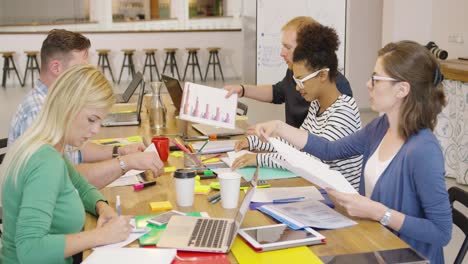 group of people working at desktop