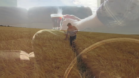 walking through wheat field, man holding steaming coffee cup with animation overlay