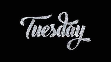 tuesday glitter text on black background