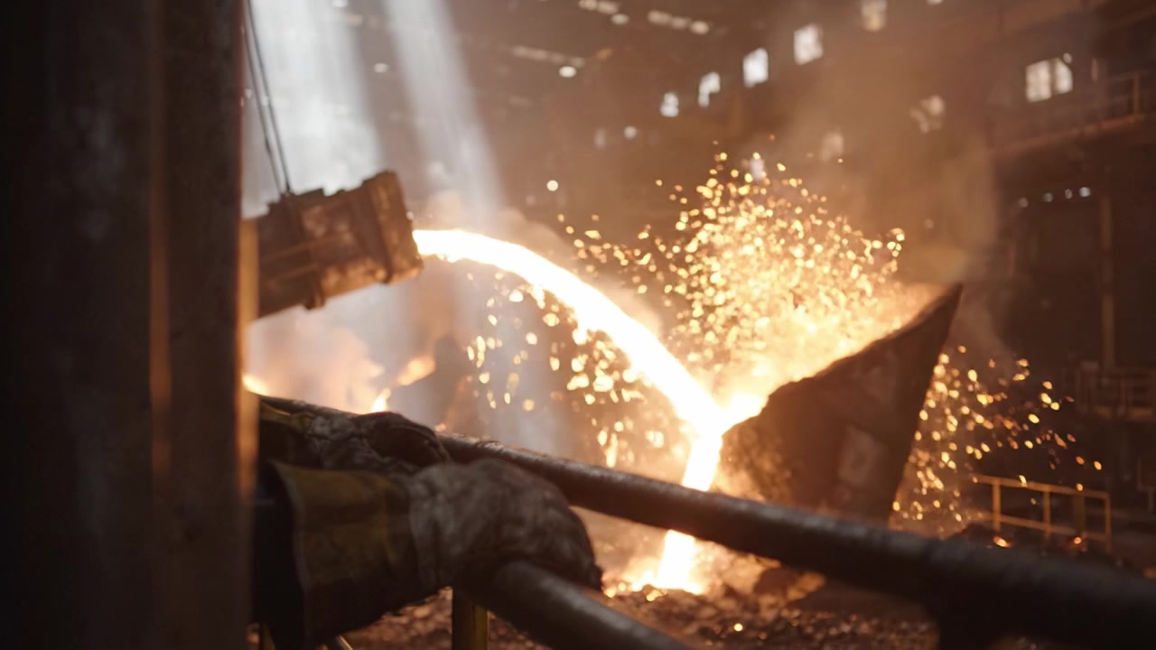 Intense Scenes of Molten Metal Pouring in a Heavy Industrial Setting, Showcasing the Power and Precision of Metallurgy and Fabrication Processes in Action