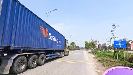 truck driving through scenic countryside road