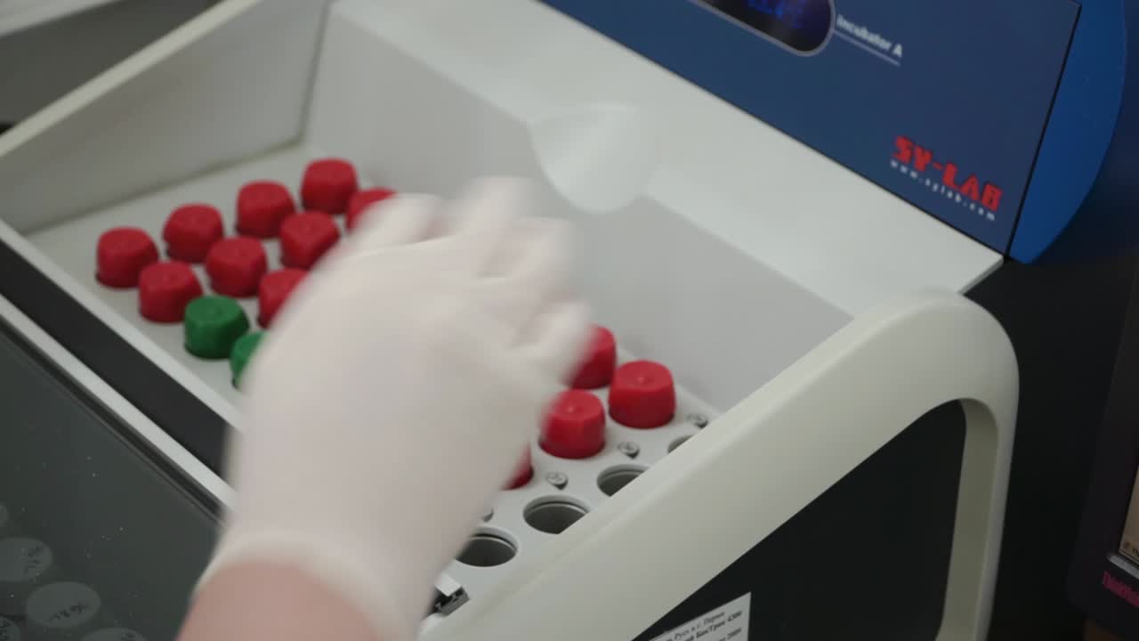 Scientist working on medical equipment
