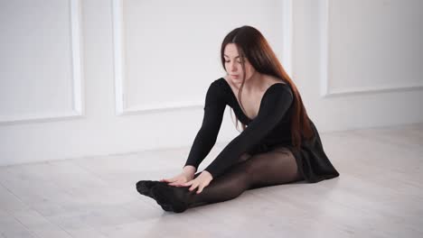 bailarín de ballet que se estira