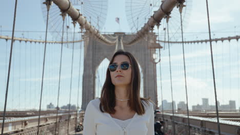 young woman on the brooklyn bridge