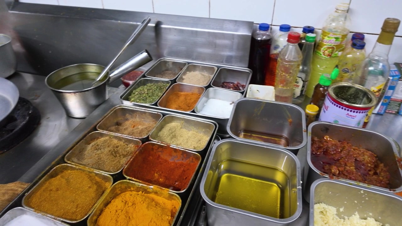 Assorted Spices and Sauces Prepared in a Professional Restaurant Kitchen