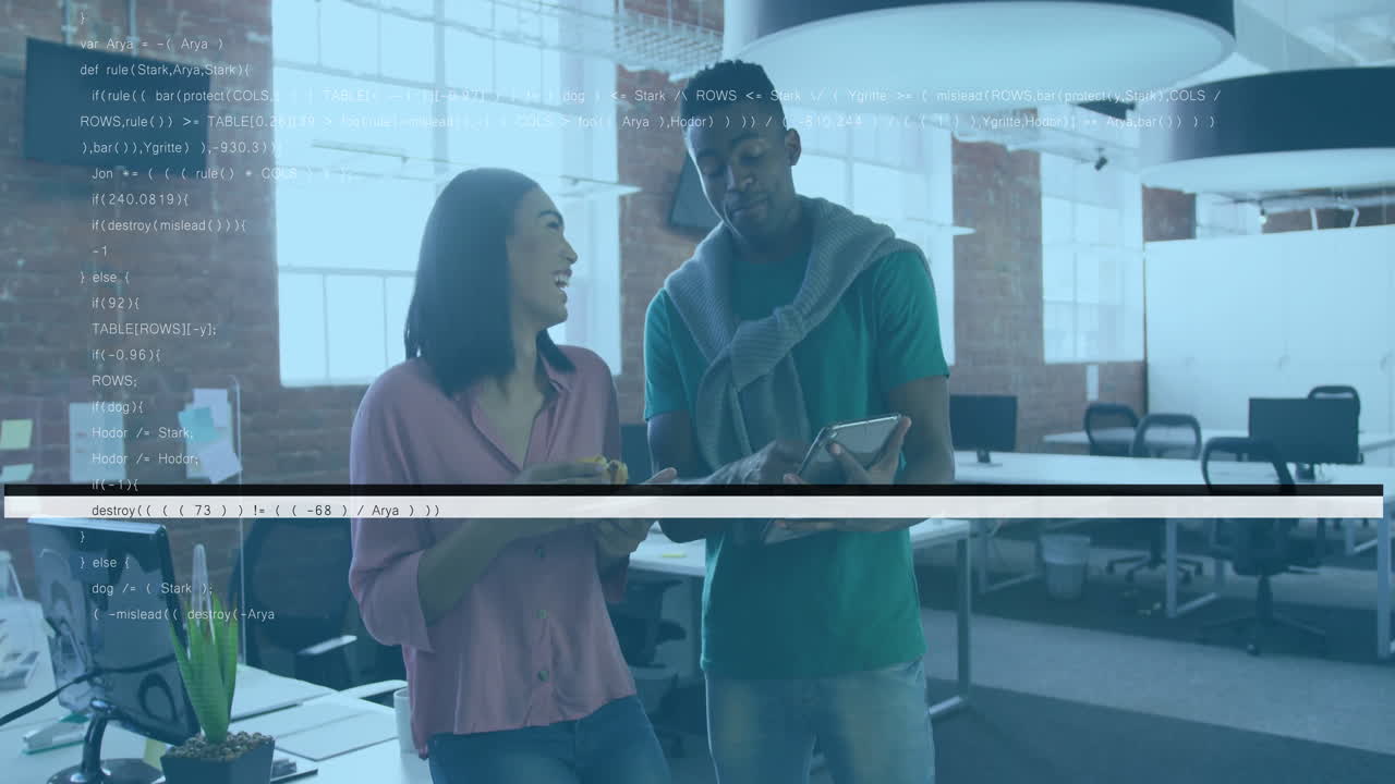 Diverse colleagues discussing work over computer code animation in modern office
