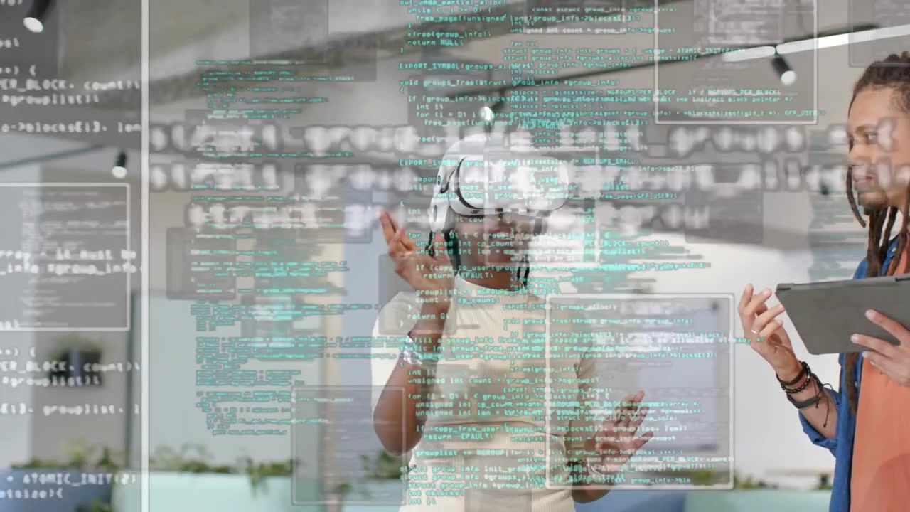Woman with white VR headset raising hands opening code panels in tech demo, colleague using tablet