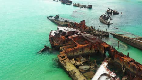 Close-up-drone-fly-over,-Moreton-Island-wrecks,-Clear-water-dive-site,-Queensland-Australia