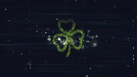 green shamrock and fireworks animation over dark background with sparkling effects