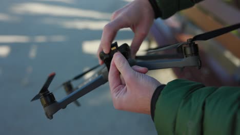 Opening-Up-Flap-To-Show-USB-Port-And-Memory-Card-Slot-On-Drone