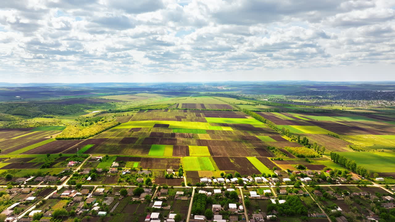 Aerial drone view of Pelinia, Drochia, Moldova with a cloudy sky