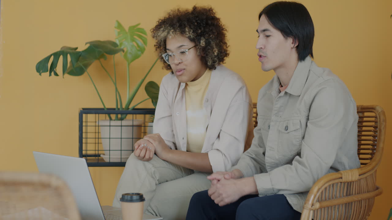 Couple in a cafe having a video call