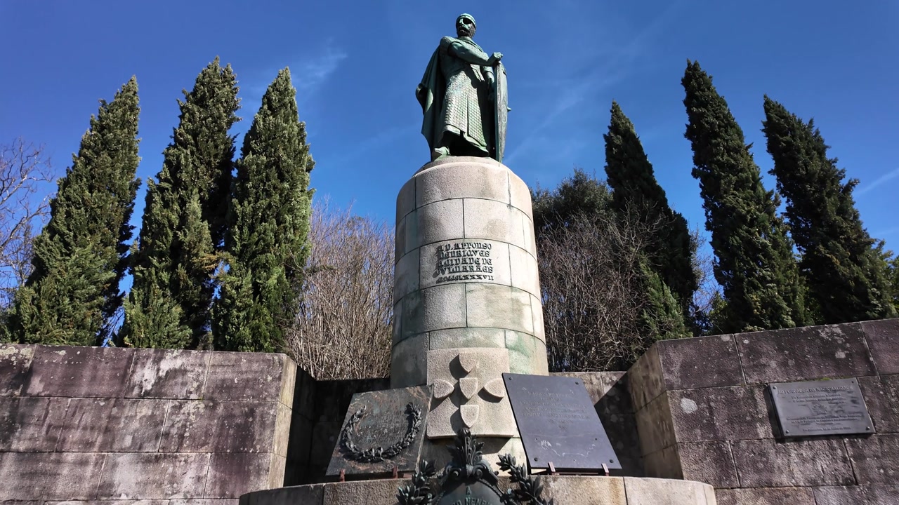 Guimaraes city monuments Dom Afonso Henriques statue on a sunny day.
