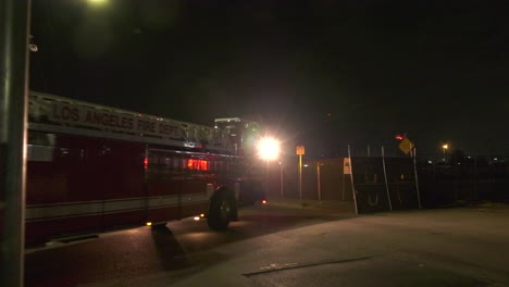 fire trucks respond with lights and sirens to 911 call