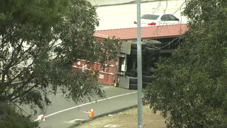 Flipped-over-semi-truck-on-freeway